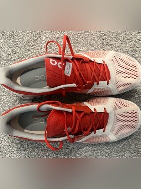 On Running Women’s Red and White Athletic Running Shoes